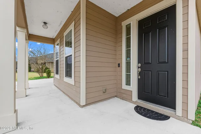 a view of a livingroom with furniture and a couch