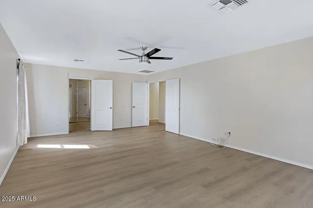 a bathroom with a granite countertop sink mirror and double