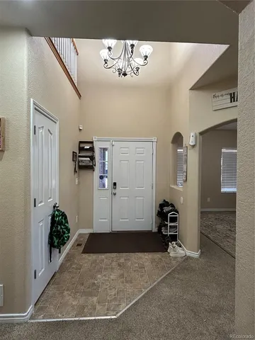a view of a hallway with closet