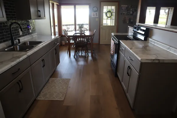 a kitchen with granite countertop lots of counter top space