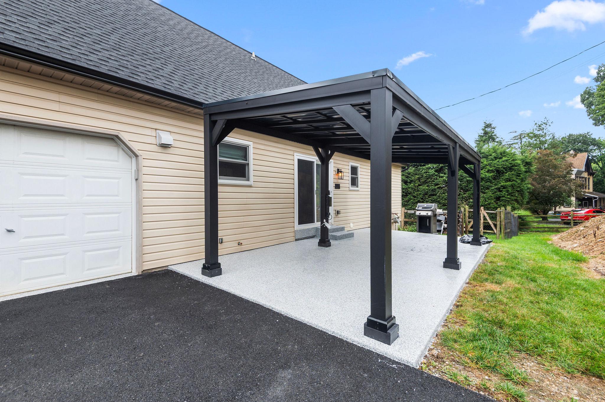 1 Ranor Court Reading, PA 19606 - Photo 29 of 29 Outdoor patio detail with matching garage finish.