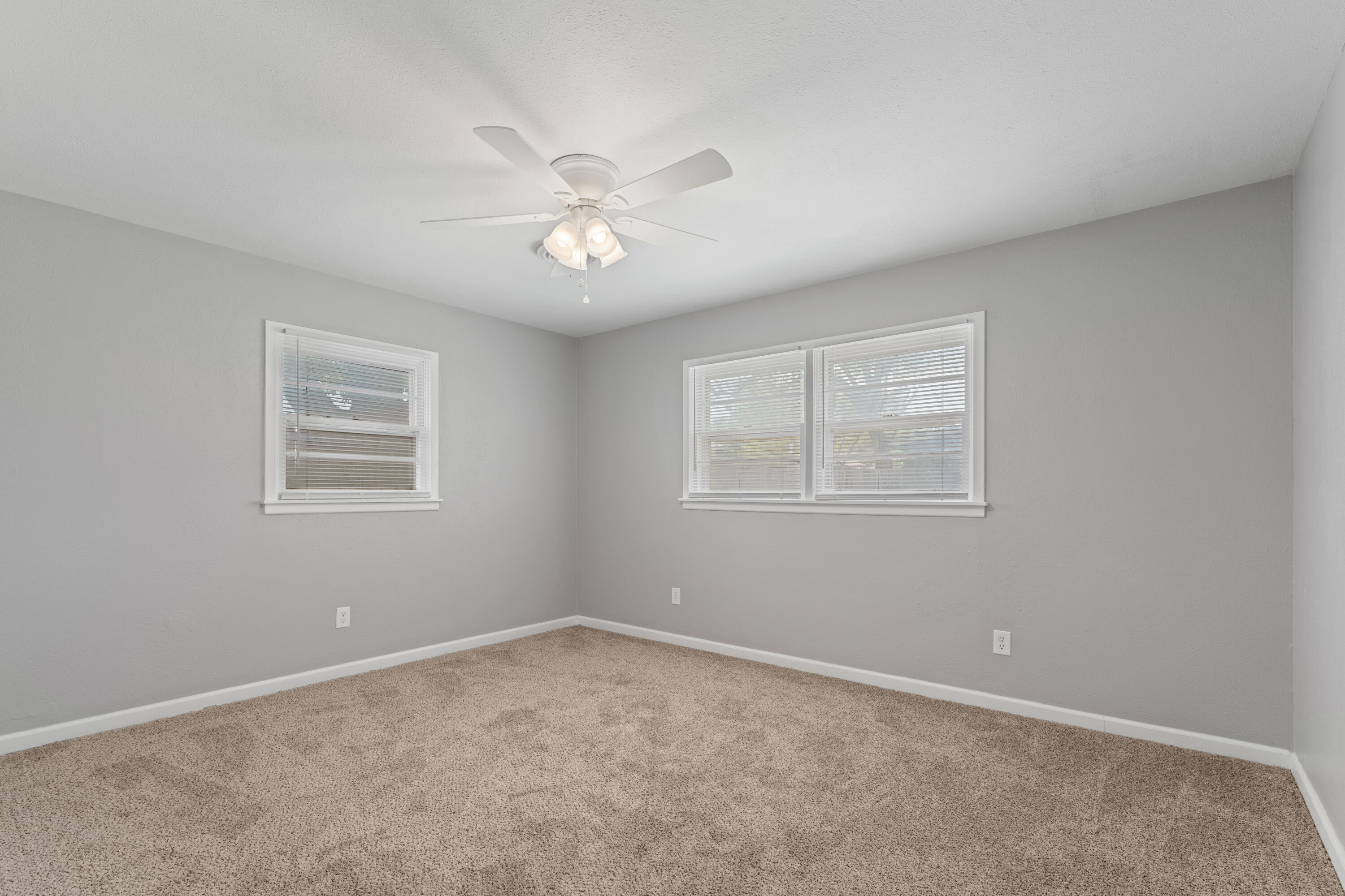 4609 31st Street Lubbock, TX 79410 - Photo 12 of 21 a view of an empty room with a window