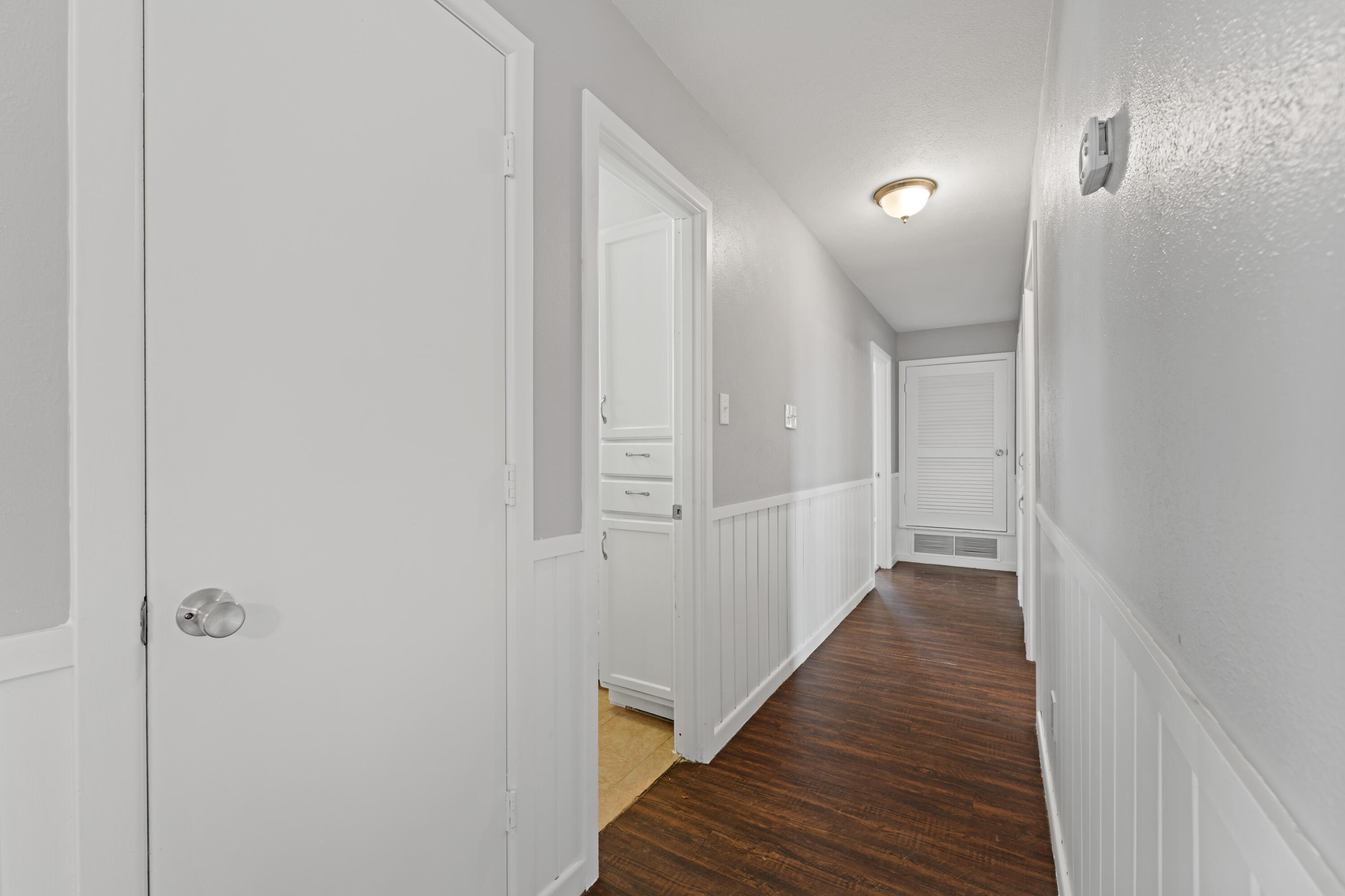 4609 31st Street Lubbock, TX 79410 - Photo 18 of 21 a view of a hallway with wooden floor