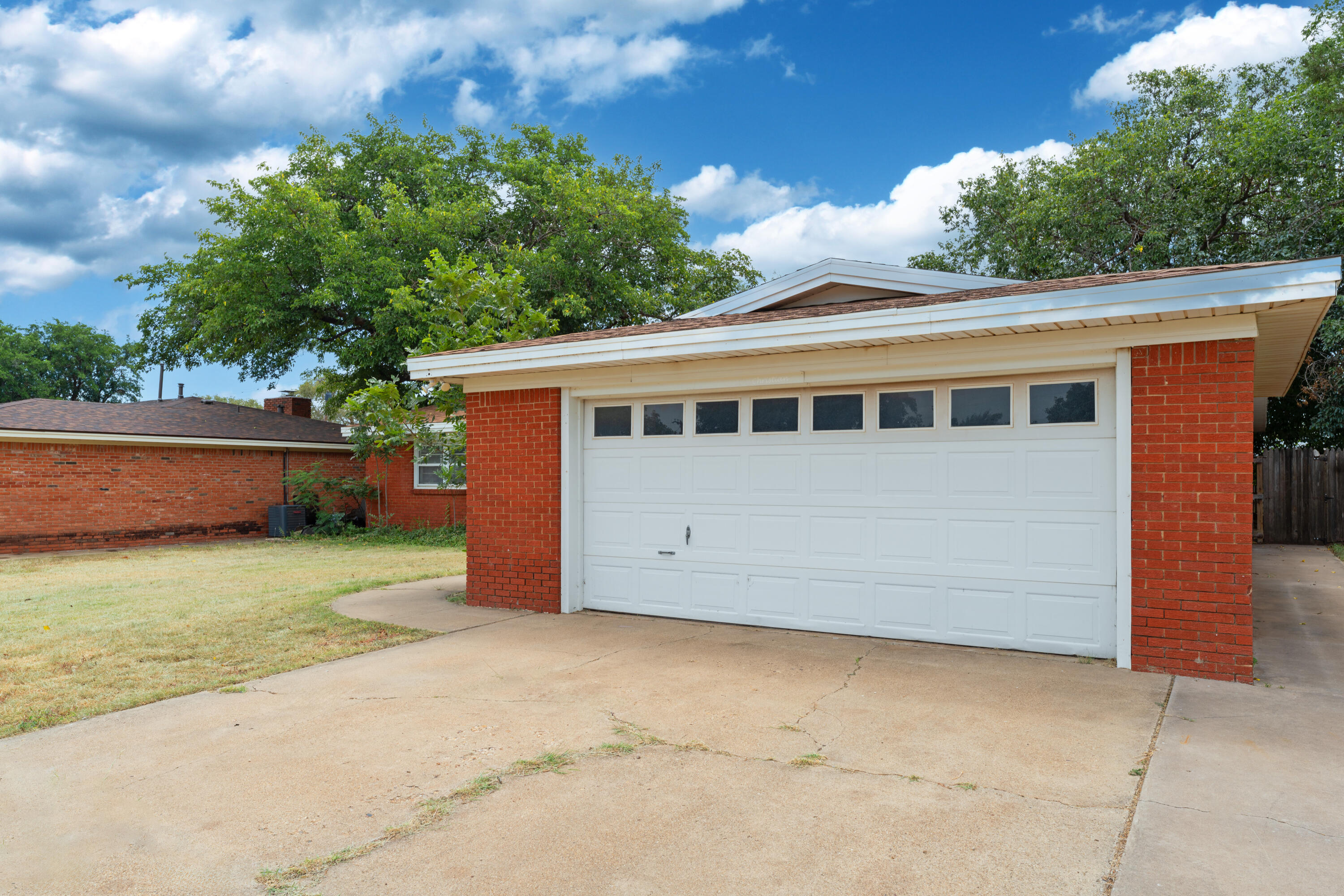 4609 31st Street Lubbock, TX 79410 - Photo 6 of 21 a view of a house with a backyard