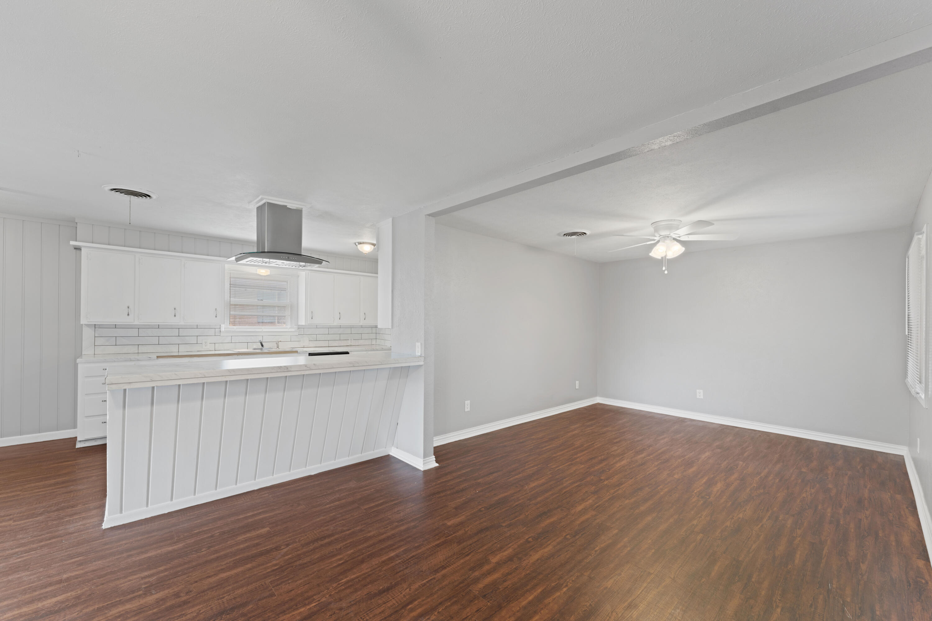 4609 31st Street Lubbock, TX 79410 - Photo 7 of 21 a view of kitchen with wooden floor