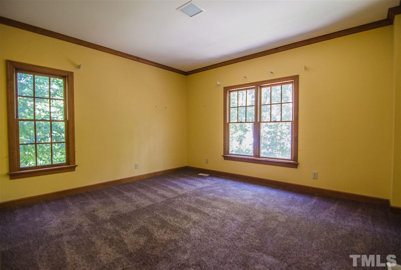 1301 Cool Spring Road Raleigh, NC 27614 - Photo 14 of 25 This is a generous sized room, new carpet, molding and lots of natural light from the 2 windows.