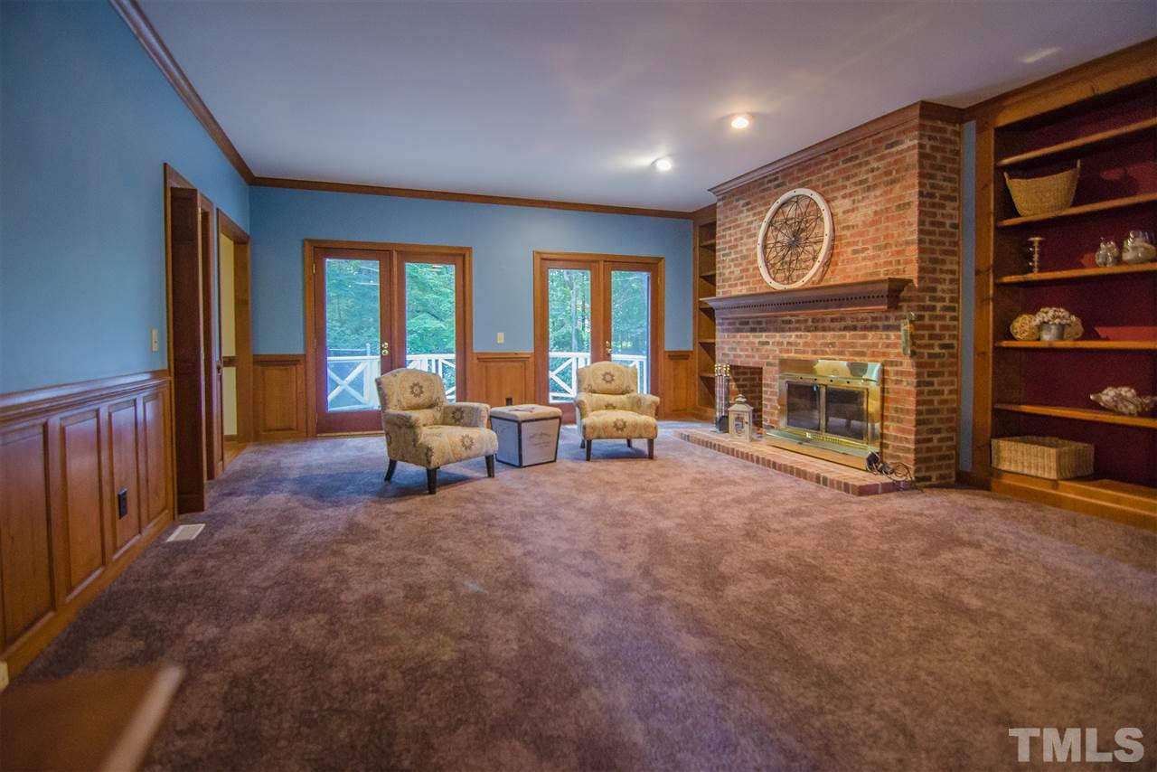 1301 Cool Spring Road Raleigh, NC 27614 - Photo 5 of 25 Spacious family room with 2 sets of doors looking over the deck and back yard. Lots of natural light.