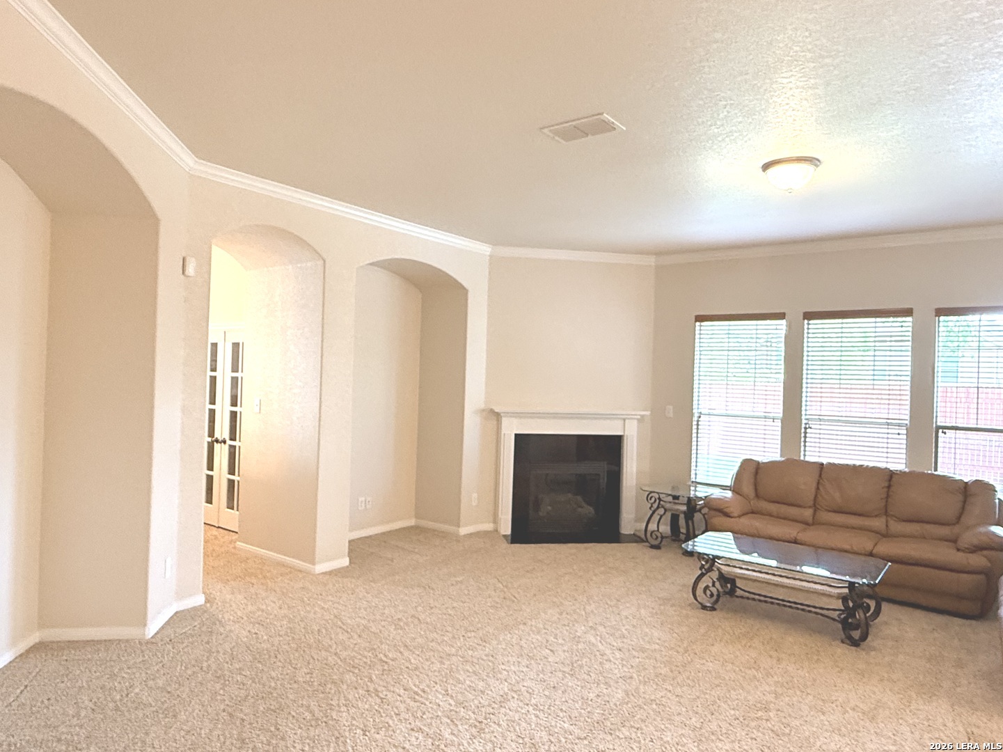 101 Rattlesnake Bluff Boerne, TX 78006 - Photo 11 of 28 a living room with furniture a ceiling fan and a window