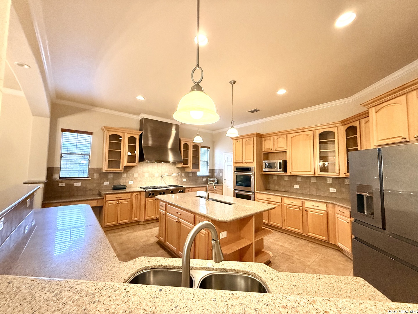 101 Rattlesnake Bluff Boerne, TX 78006 - Photo 12 of 28 a large kitchen with a table and chairs