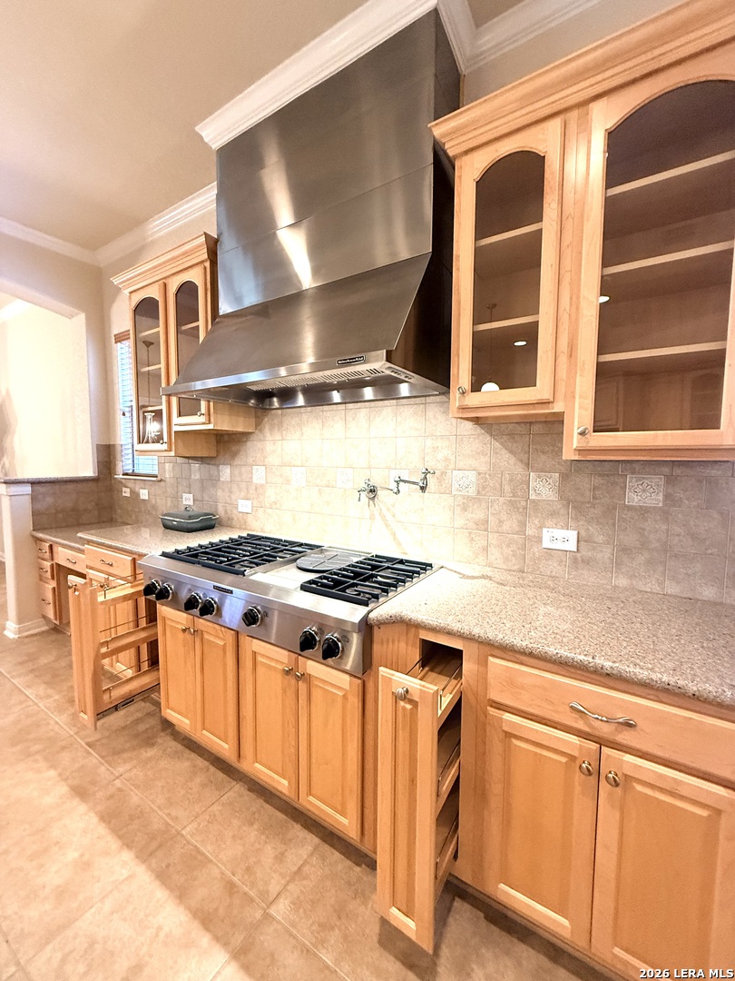 101 Rattlesnake Bluff Boerne, TX 78006 - Photo 16 of 28 a kitchen with stainless steel appliances granite countertop a stove and a sink