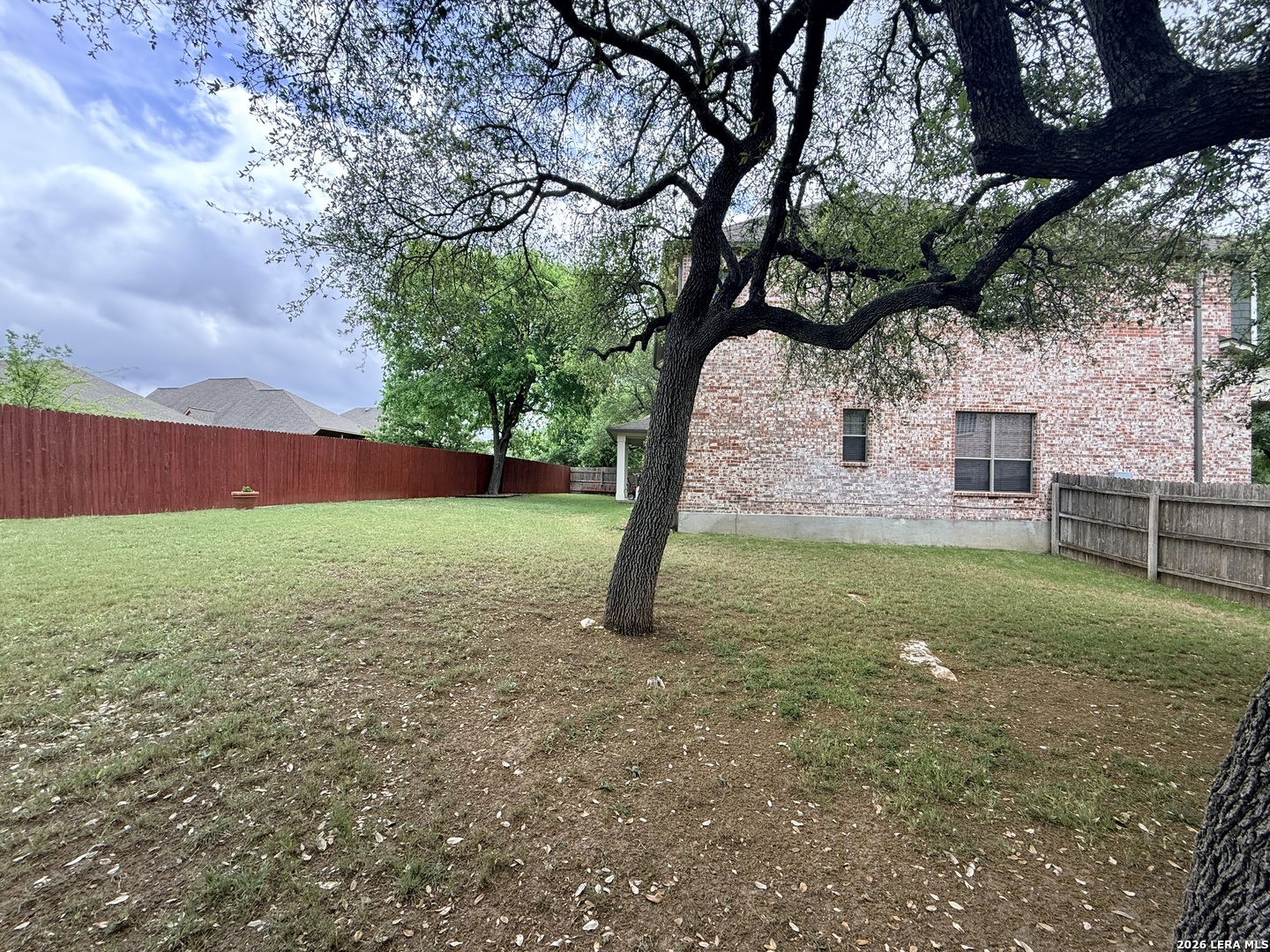 101 Rattlesnake Bluff Boerne, TX 78006 - Photo 22 of 28 a view of yard with swimming pool