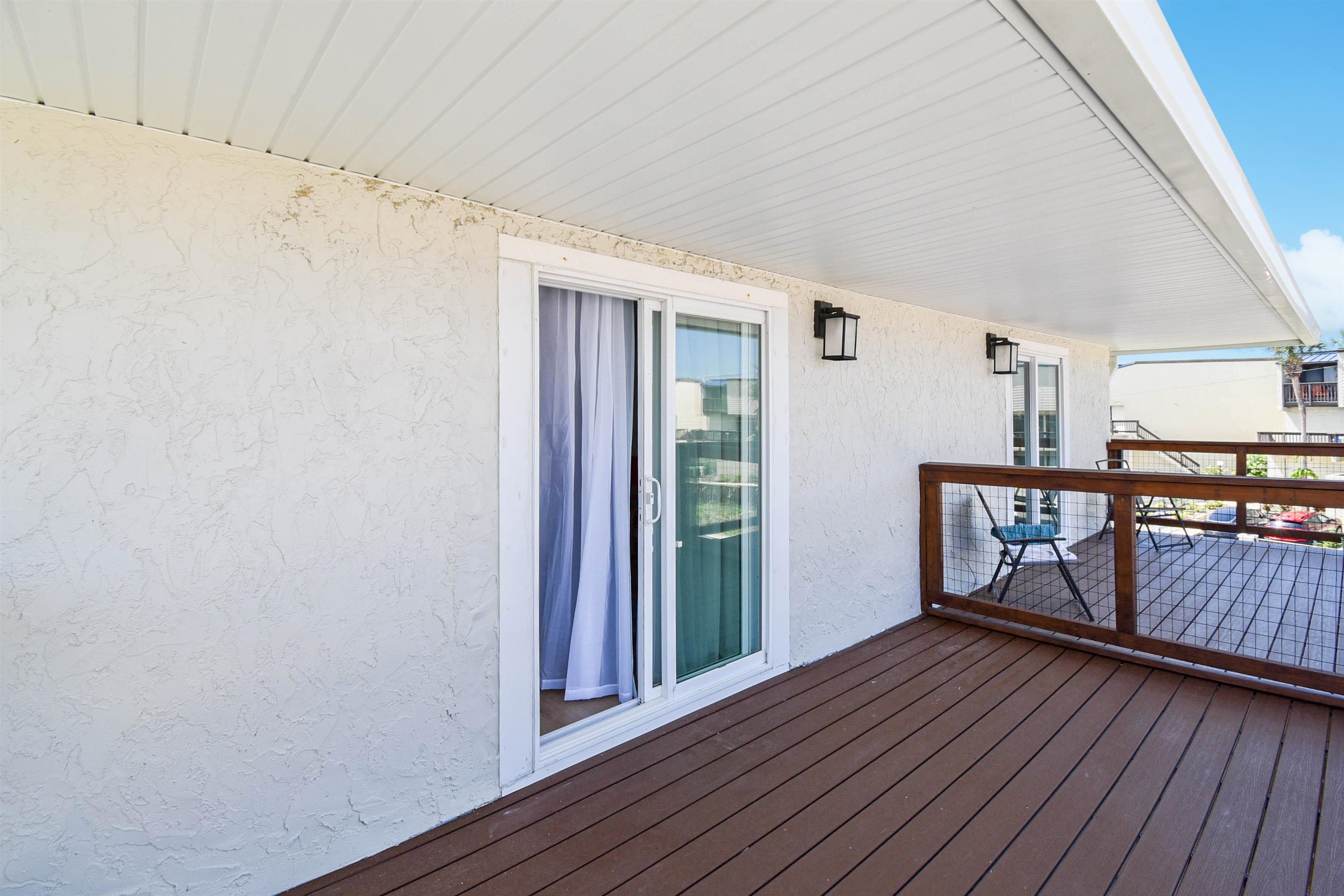 5703 Rudolph Avenue St. Augustine, FL 32080 - Photo 23 of 29 a view of a hallway with wooden floor