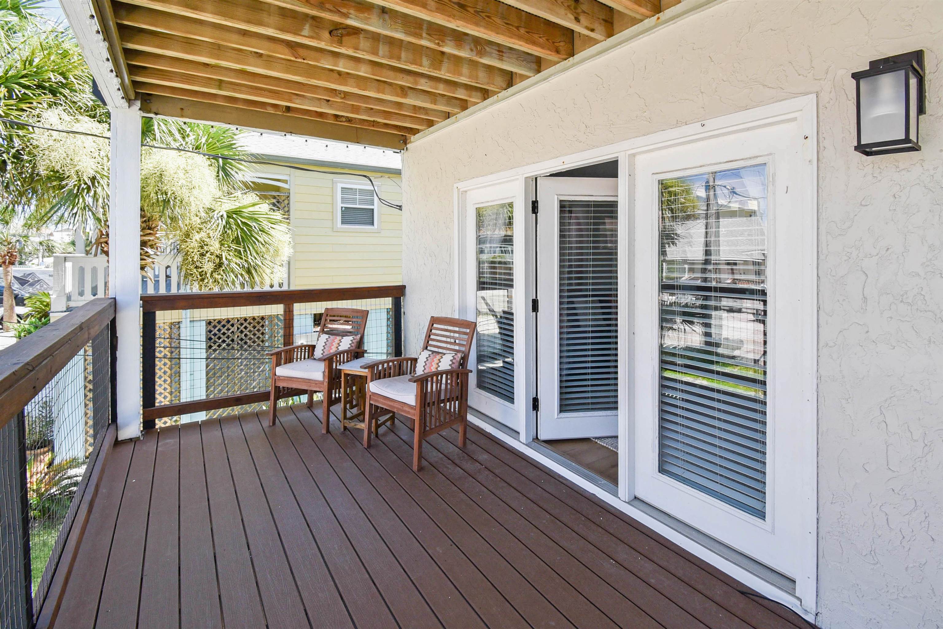 5703 Rudolph Avenue St. Augustine, FL 32080 - Photo 25 of 29 a dining room with furniture and wooden floor