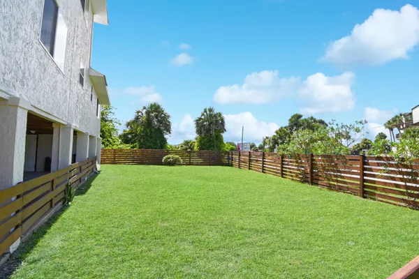 a view of a backyard with garden