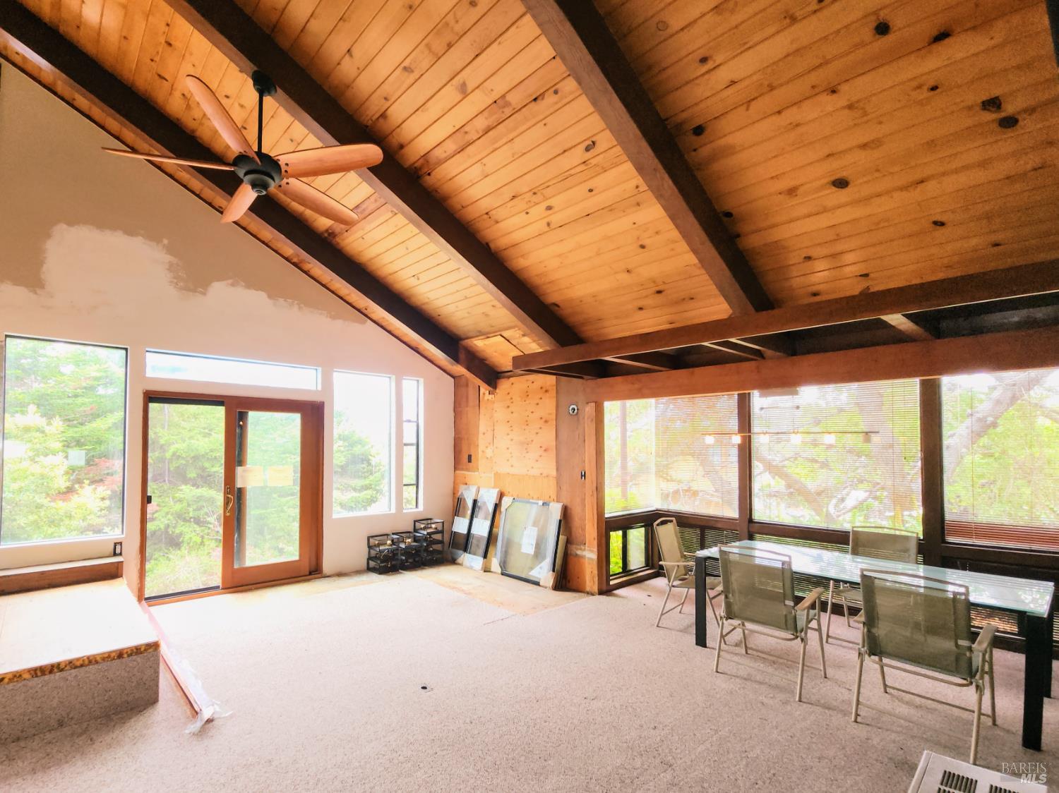 15551 Forest View Road Manchester, CA 95459 - Photo 2 of 53 a view of an empty room with a large window