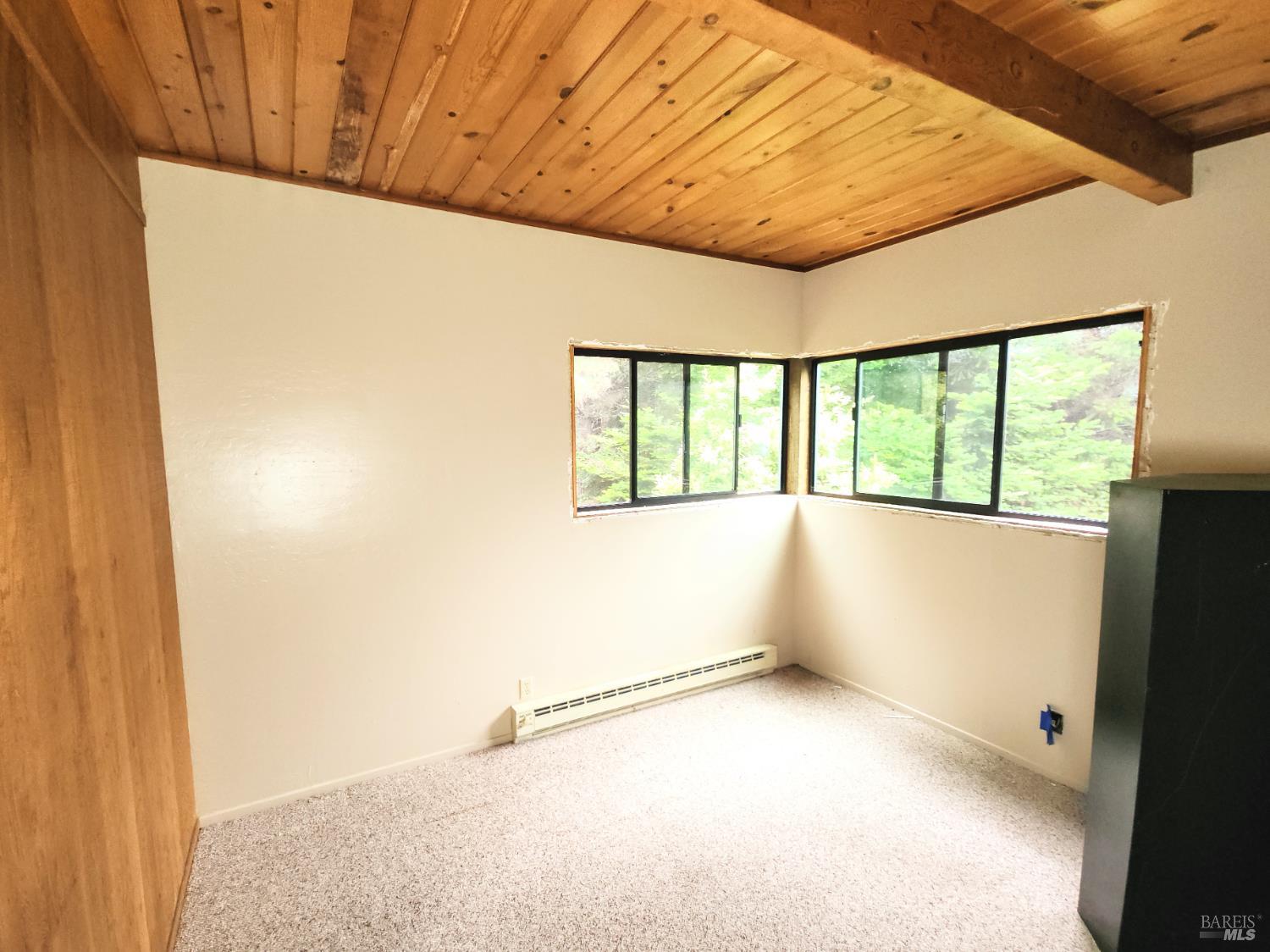 15551 Forest View Road Manchester, CA 95459 - Photo 27 of 53 view of an empty room with a window