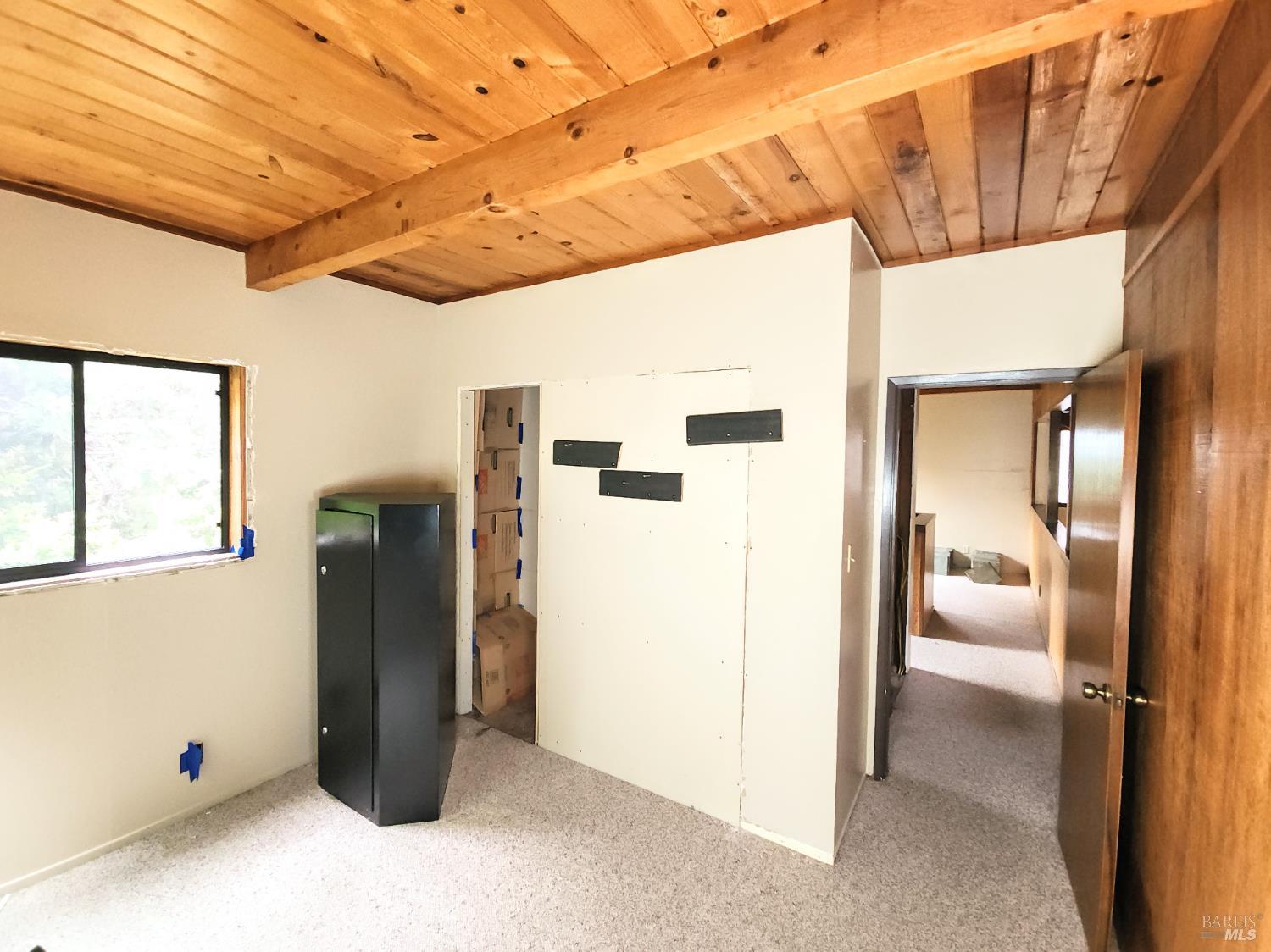 15551 Forest View Road Manchester, CA 95459 - Photo 28 of 53 a view of a refrigerator in kitchen and a glass door