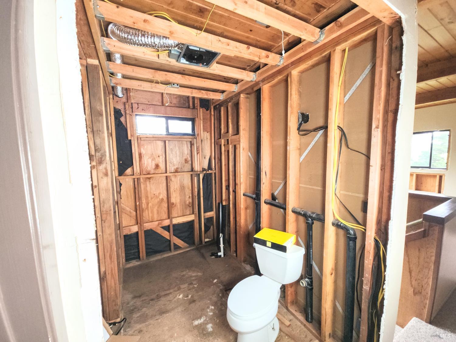 15551 Forest View Road Manchester, CA 95459 - Photo 30 of 53 a bathroom with a toilet and shower