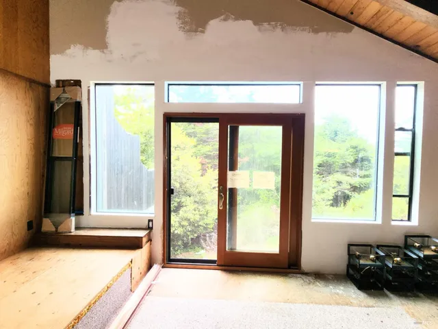 a view of a living room and a window
