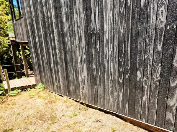 a picture of a bathroom with mirror gate
