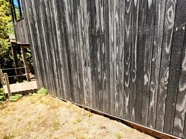a picture of a bathroom with mirror gate