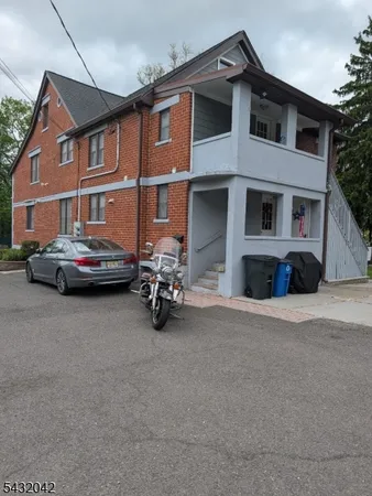 a car parked in front of a house