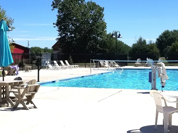 a view of a house with a swimming pool