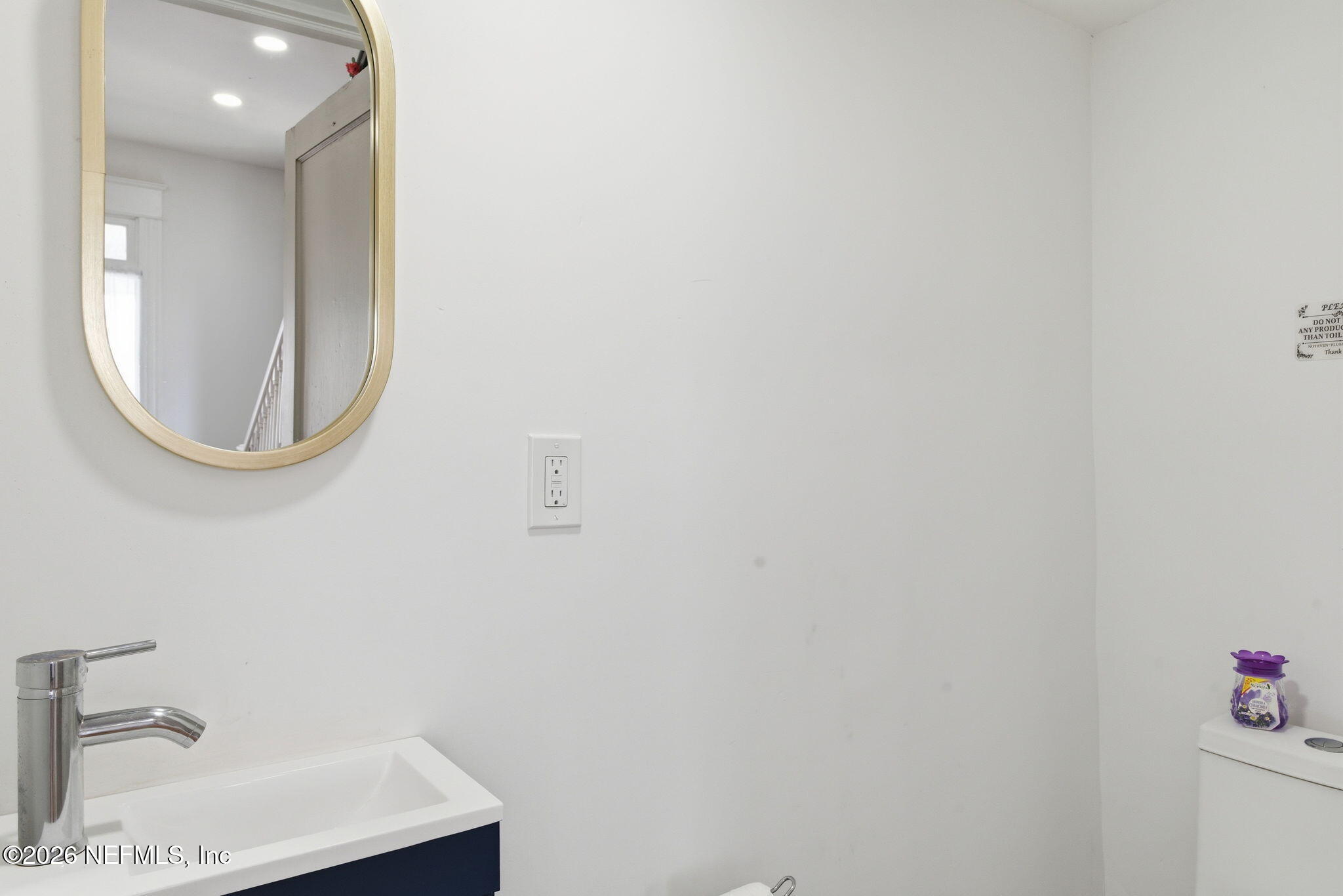 422 7th Street West Jacksonville, FL 32206 - Photo 15 of 71 a bathroom with a sink and a mirror