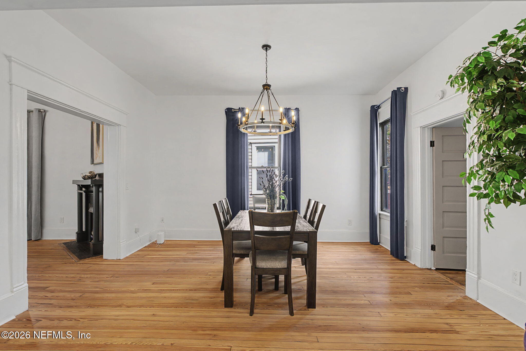 422 7th Street West Jacksonville, FL 32206 - Photo 15 of 71 a view of a dining room with furniture window and wooden floor