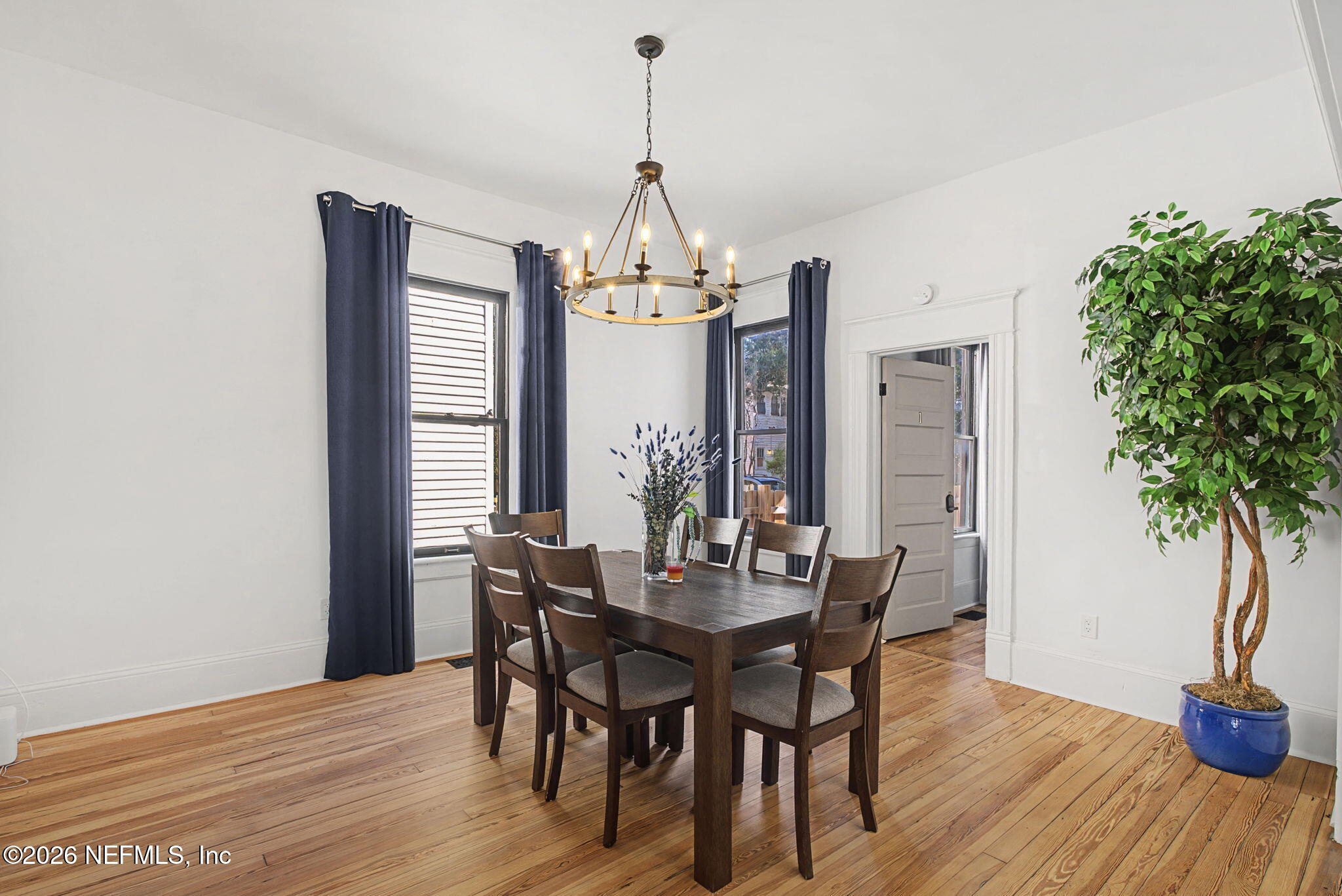 422 7th Street West Jacksonville, FL 32206 - Photo 23 of 71 a view of a dining room with furniture window and wooden floor