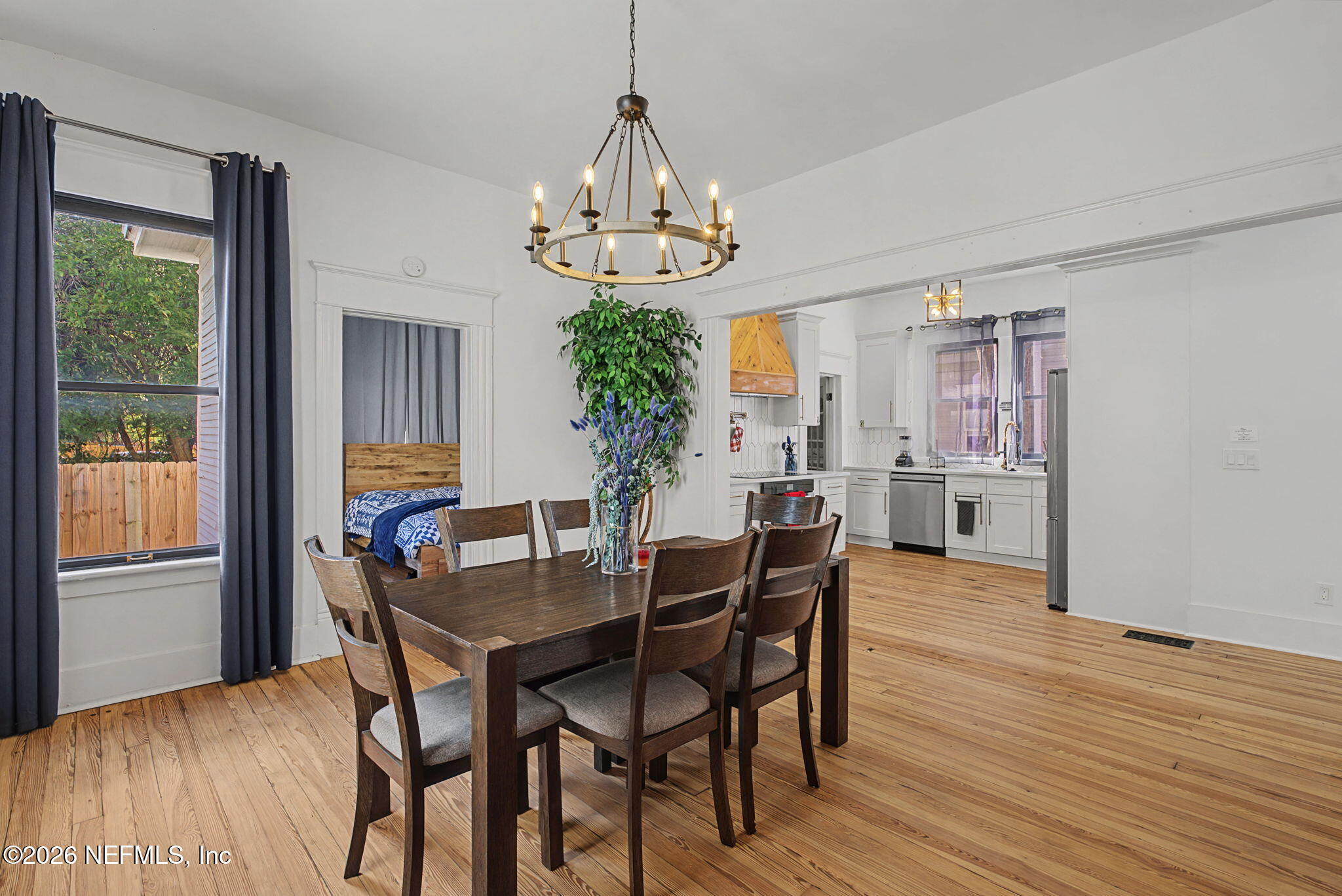 422 7th Street West Jacksonville, FL 32206 - Photo 24 of 71 a view of a dining room with furniture window and wooden floor