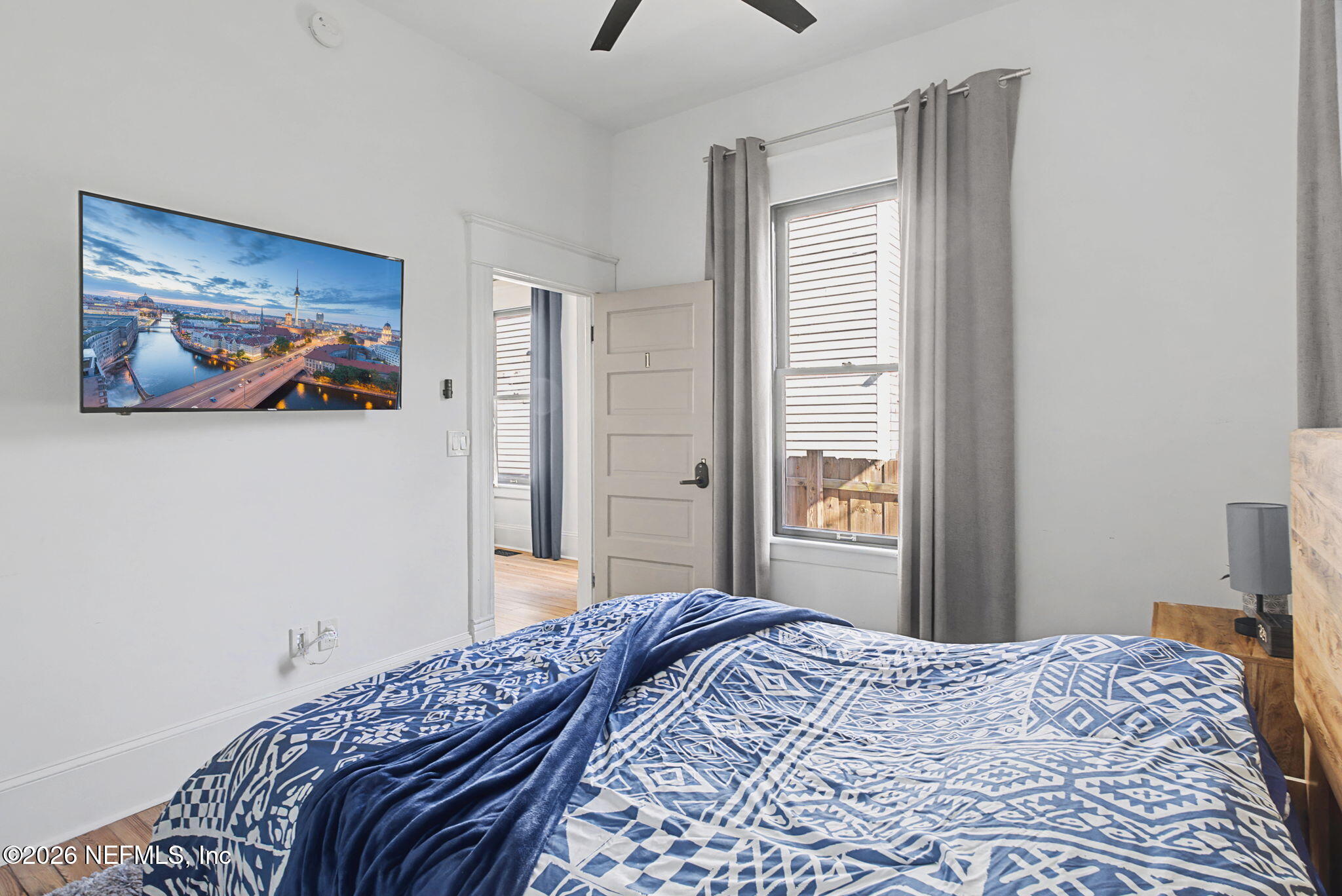 422 7th Street West Jacksonville, FL 32206 - Photo 29 of 71 a bedroom with a bed and a painting on the wall