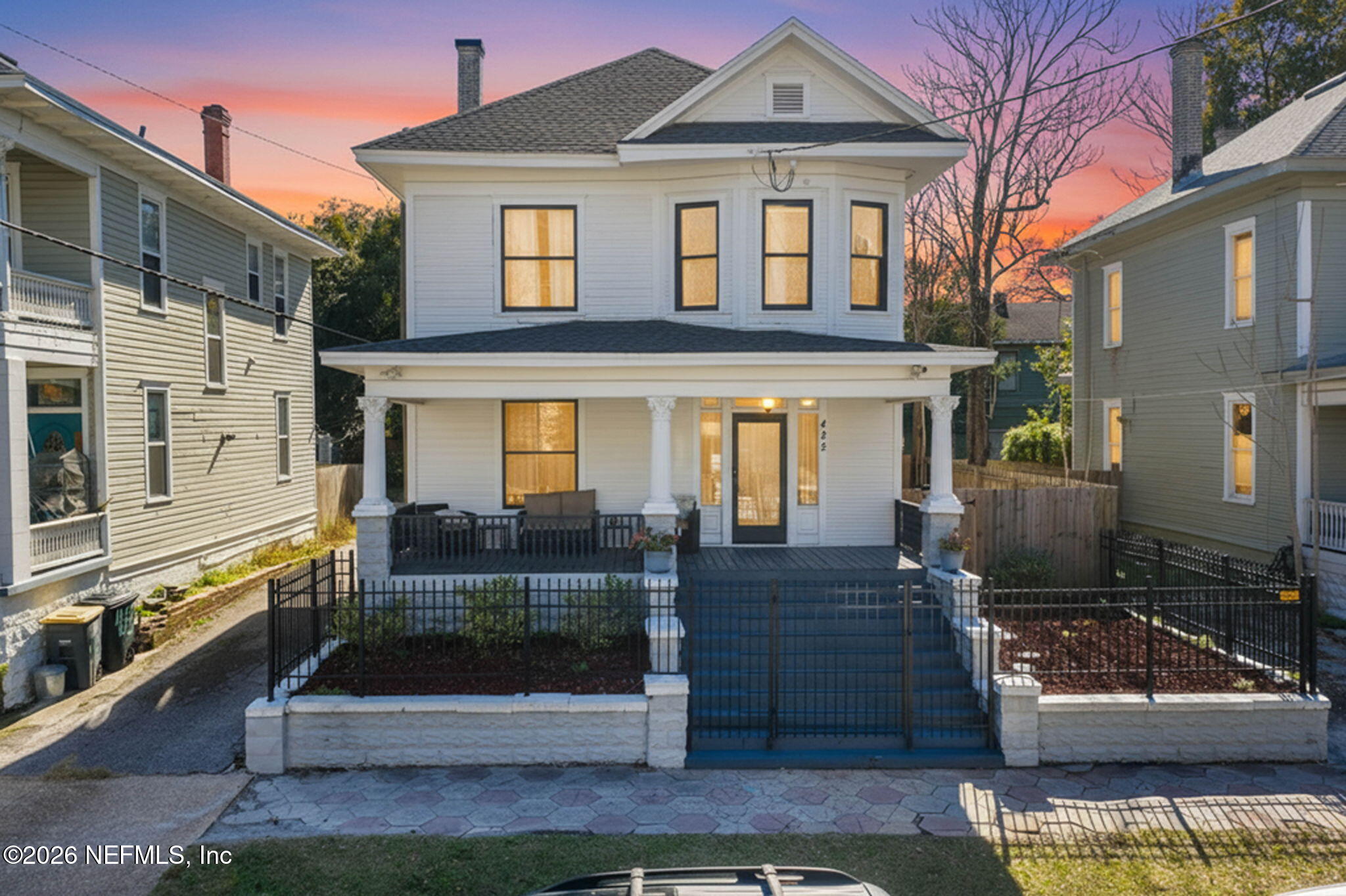 422 7th Street West Jacksonville, FL 32206 - Photo 3 of 71 a front view of a house with barbeque and outdoor seating