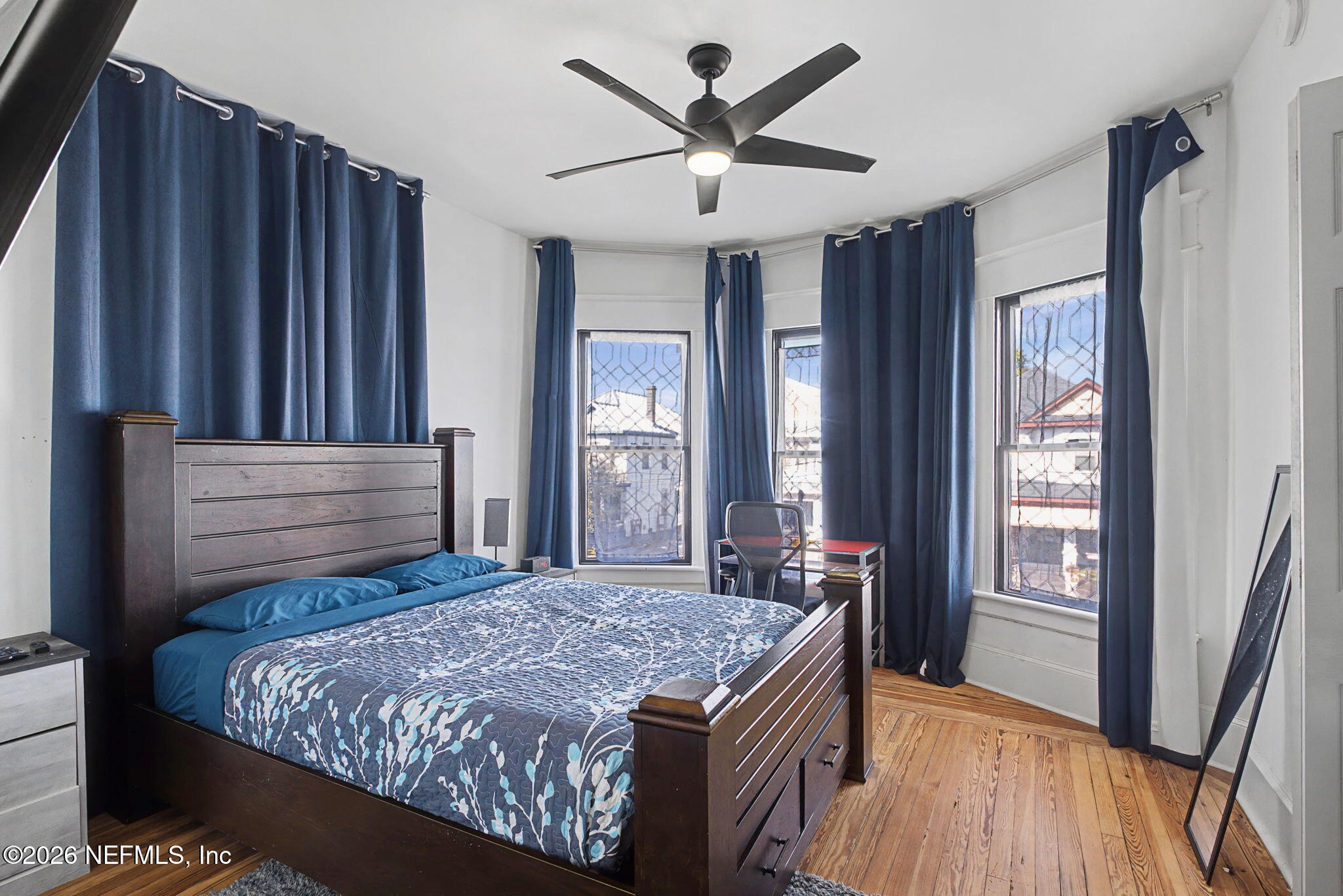 422 7th Street West Jacksonville, FL 32206 - Photo 37 of 71 a bedroom with a bed and a large window