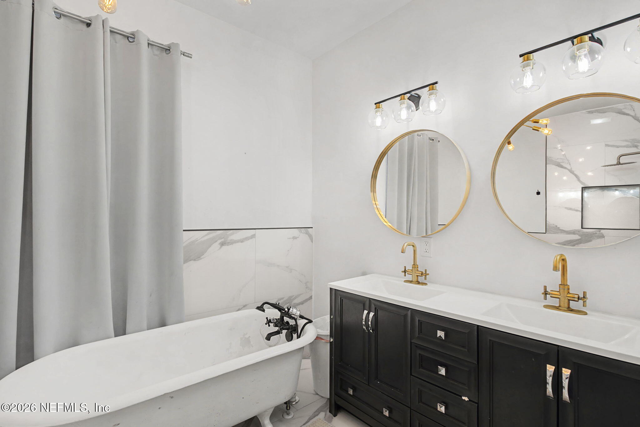 422 7th Street West Jacksonville, FL 32206 - Photo 45 of 71 a bathroom with a sink vanity granite and a mirror