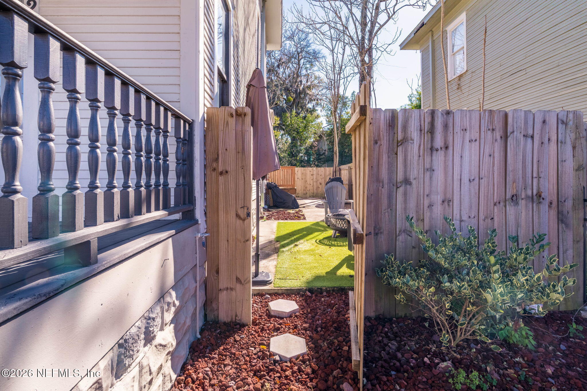 422 7th Street West Jacksonville, FL 32206 - Photo 47 of 71 a view of a house with backyard and wooden fence