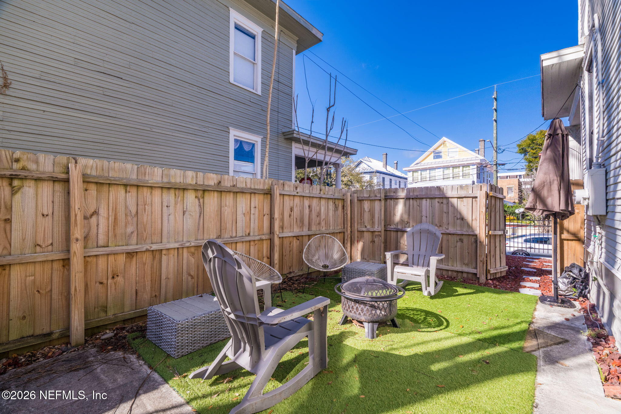 422 7th Street West Jacksonville, FL 32206 - Photo 50 of 71 a view of a chair and tables in the patio