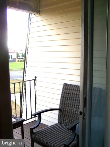 a view of wooden floor in an empty room