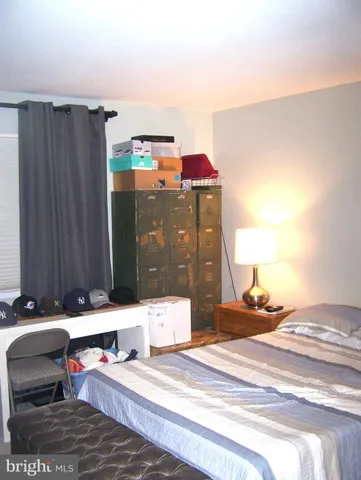 a bed room with a bed and a couch