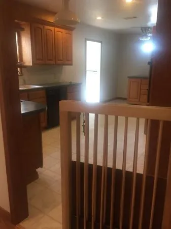 a view of wooden floor and a window