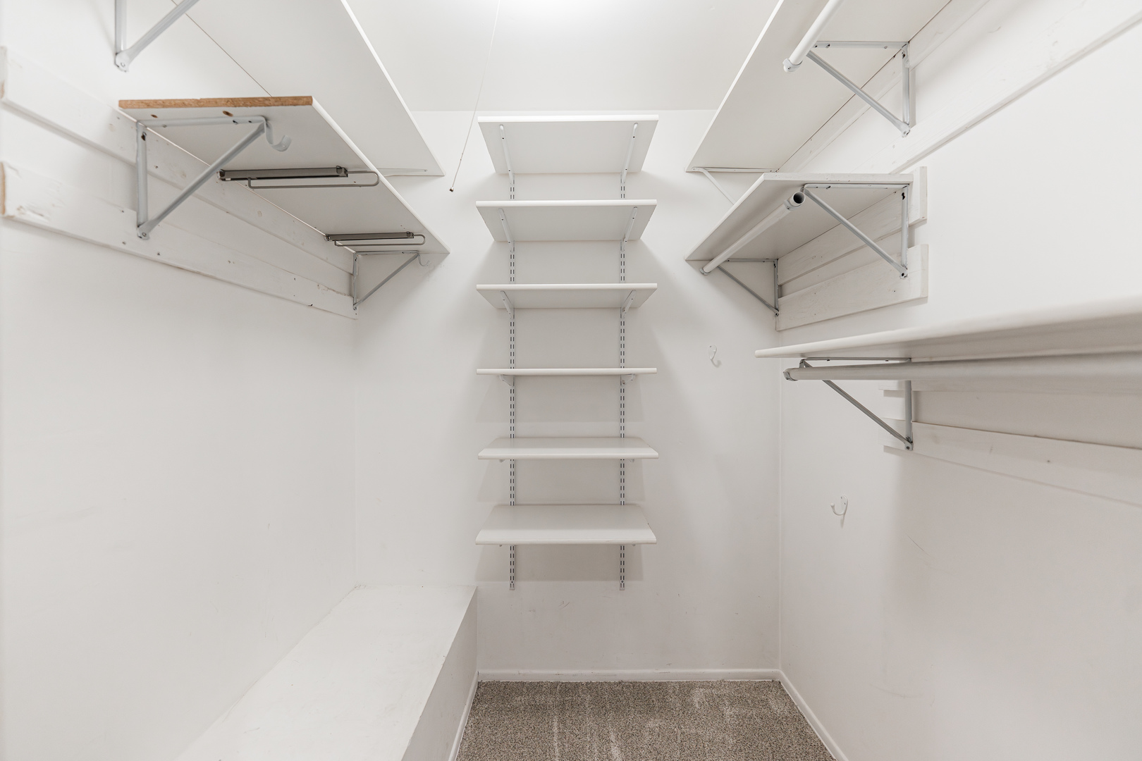 327 Georgetown Court, Unit B Bloomingdale, IL 60108 - Photo 13 of 25 a view of walk in closet with empty racks