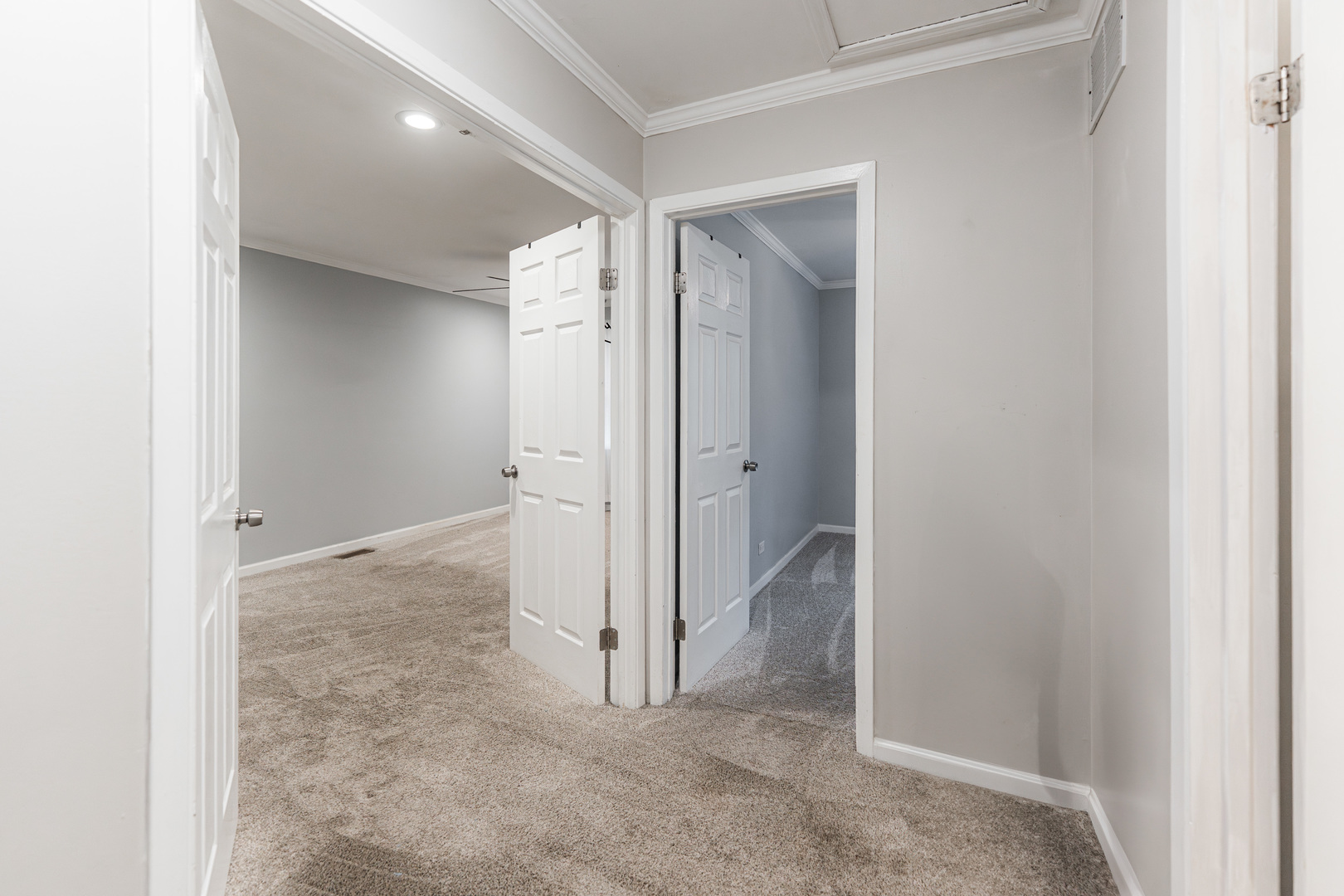 327 Georgetown Court, Unit B Bloomingdale, IL 60108 - Photo 18 of 25 an empty room with an entrance to other room