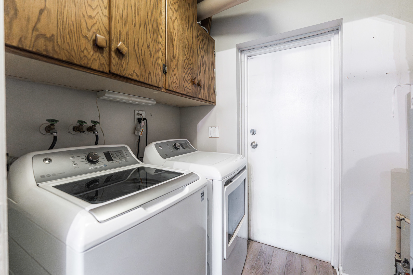 327 Georgetown Court, Unit B Bloomingdale, IL 60108 - Photo 19 of 25 a utility room with dryer and washer