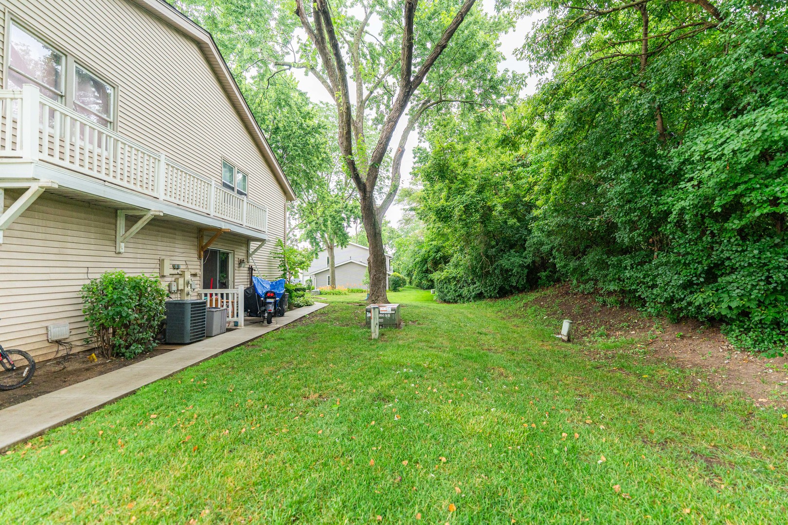327 Georgetown Court, Unit B Bloomingdale, IL 60108 - Photo 25 of 25 a view of a garden with a patio