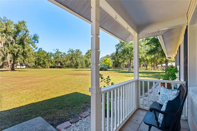 a view of a balcony with lake view and a ocean view
