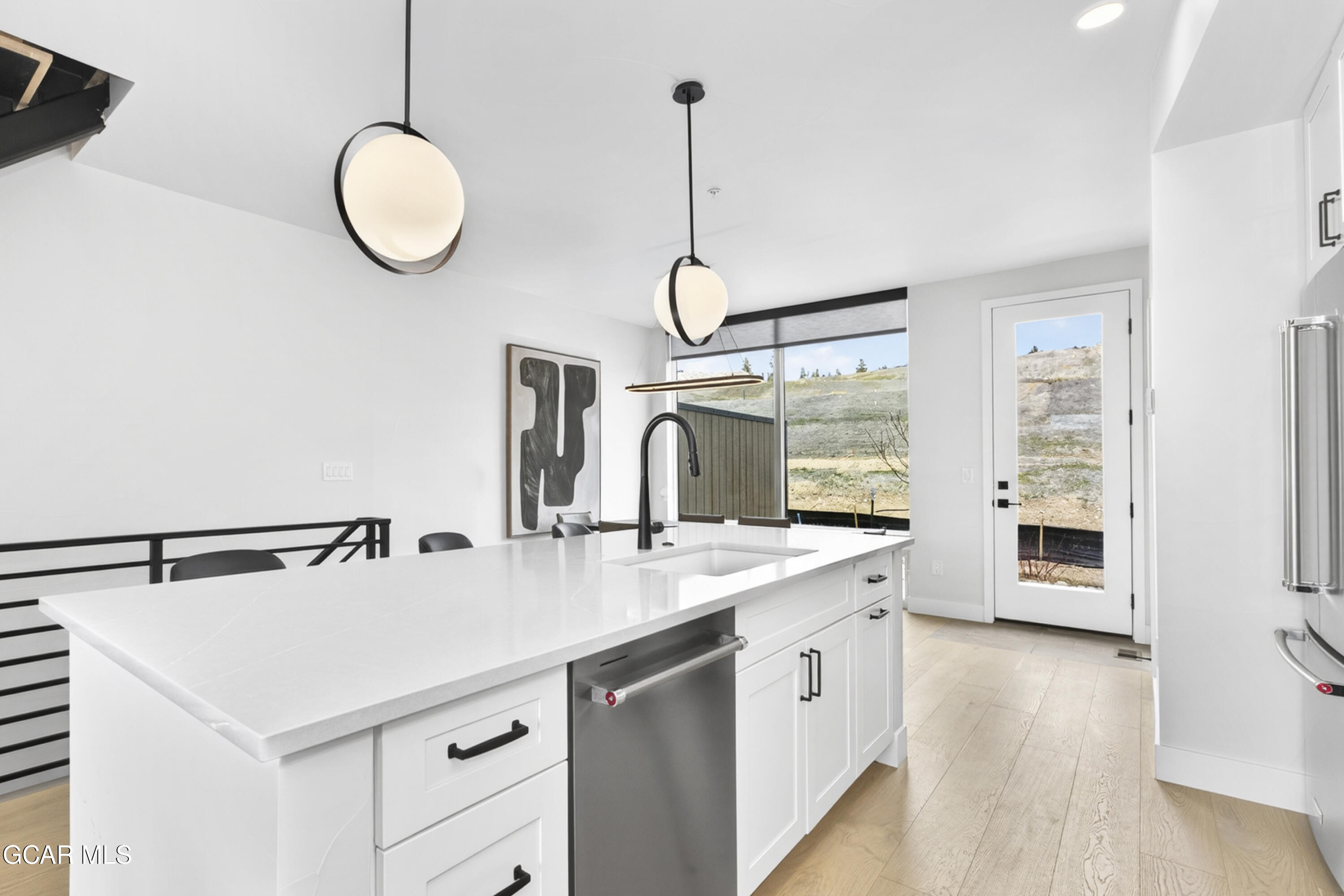60 Wheeler Road Winter Park, CO 80482 - Photo 13 of 43 a kitchen with a sink and appliances