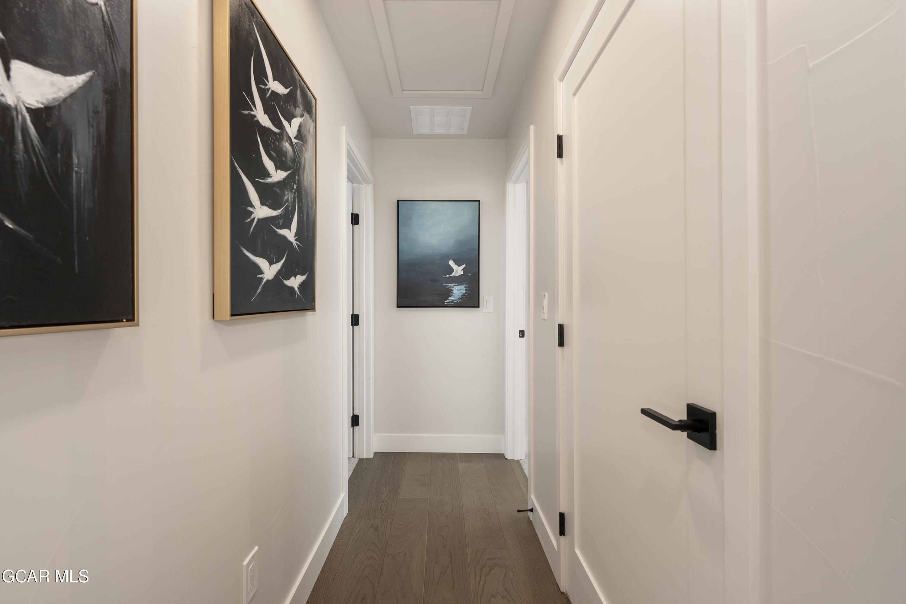 60 Wheeler Road Winter Park, CO 80482 - Photo 20 of 53 a view of a hallway with wooden floor and a bathroom
