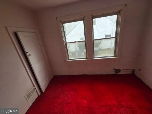 an empty room with a window