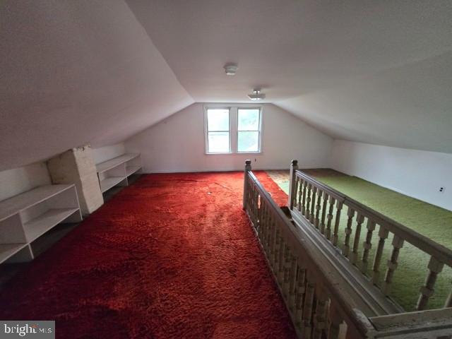 1677 Fairview Avenue Willow Grove, PA 19090 - Photo 16 of 18 a view of an empty room with wooden floor and stairs