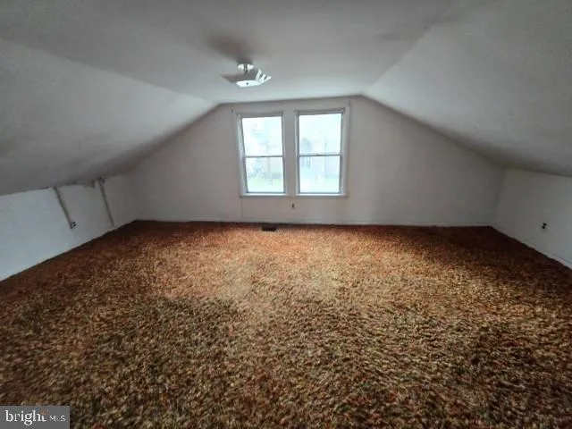 an empty room with a natural light